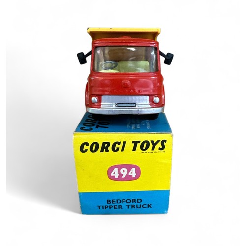 211 - Corgi Bedford Tipper No. 494, generally excellent in excellent (possibly reproduction) box, red cab ... 