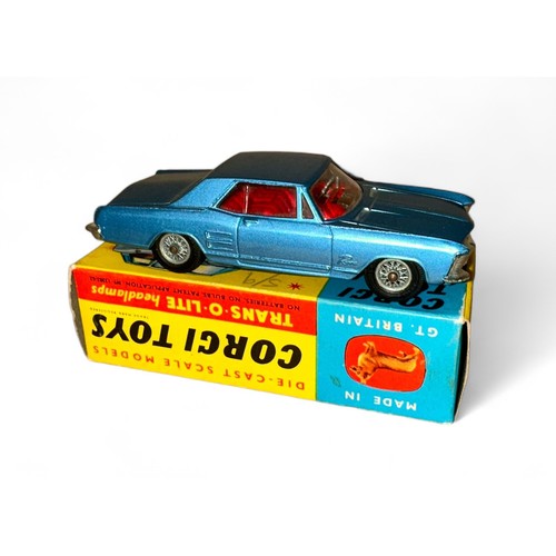 99 - Corgi Buick Riviera No. 245, metallic blue, red interior, tow bar and wire wheel-style hubs. Content... 