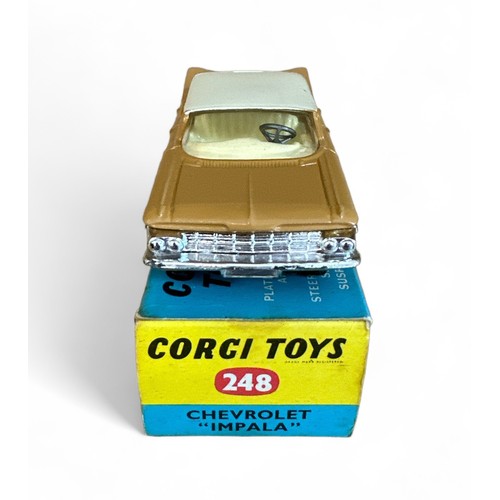 100 - Corgi Chevrolet Impala No. 248, tan with white roof, cream interior and spun hubs, generally excelle... 