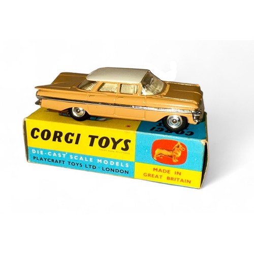 100 - Corgi Chevrolet Impala No. 248, tan with white roof, cream interior and spun hubs, generally excelle... 