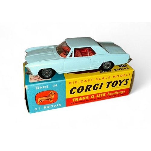 98 - Corgi Buick Riviera No. 245, pale blue, red interior, tow bar, wire wheel-style hubs and folded leaf... 