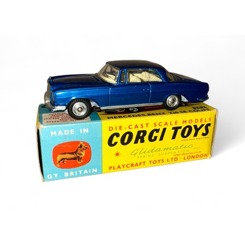 103 - Corgi Mercedes-Benz 220 SE Coupe No. 253, metallic blue, cream interior, luggage (2) and spare wheel... 