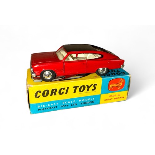 107 - Corgi Marlin by Rambler No. 263, two-tone red and black, cream interior, spun hubs and tow bar, gene... 