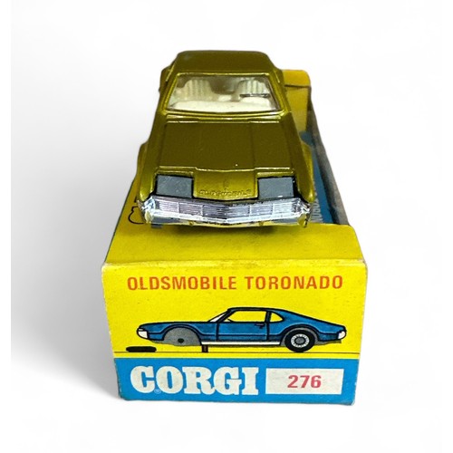 115 - Corgi Oldsmobile Toronado No. 276, metallic lime, cream interior, cast hubs, Golden Jacks, Take-Off ... 