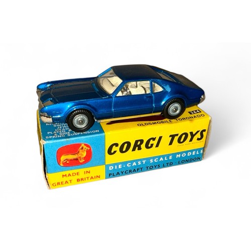 108 - Corgi Oldsmobile Toronado No. 264, metallic blue, cream interior and cast hubs, generally excellent ... 