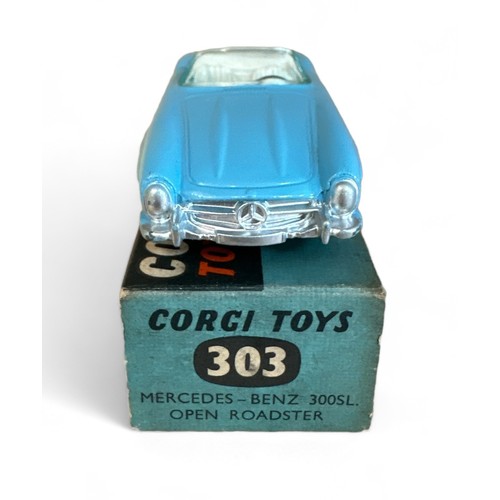 119 - Corgi Mercedes-Benz 300SL No. 303, light blue, white interior, flat hubs and folded leaflet, general... 