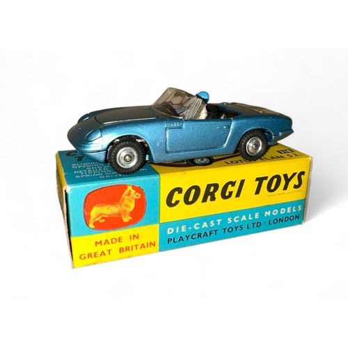 128 - Corgi Lotus Elan S2 No. 318, metallic blue, black interior, side windows, tan lower dashboard, 