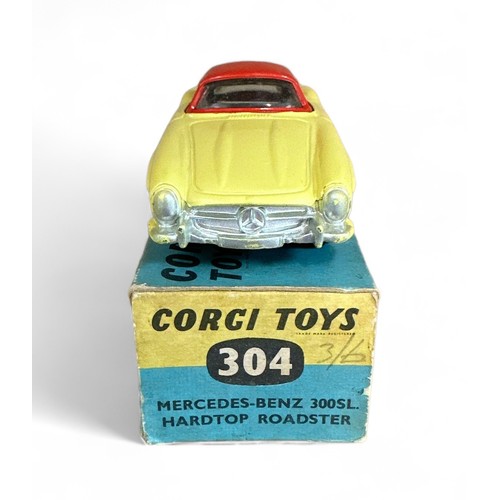 121 - Corgi No. 304 Mercedes-Benz 300SL Hardtop Roadster, yellow, red hardtop and flat hubs, generally exc... 