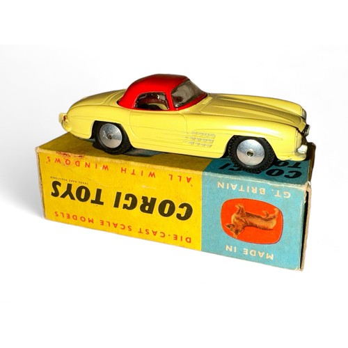 121 - Corgi No. 304 Mercedes-Benz 300SL Hardtop Roadster, yellow, red hardtop and flat hubs, generally exc... 