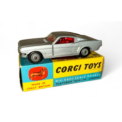 131 - Corgi Ford Mustang 2+2 No. 320, metallic silver, red interior, Corgi figure on back shelf and wire w... 