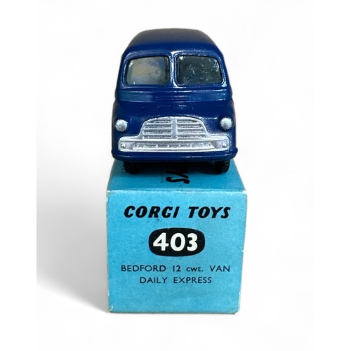 153 - Corgi Bedford Van Daily Express No. 403, dark blue, flat hubs, Daily Express  decals to both sides a... 