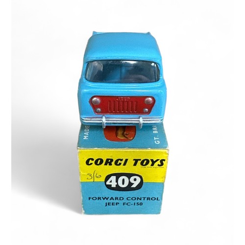 166 - Corgi Jeep FC-150 No. 409, pale blue, metal tow hook, flat hubs and spare wheel, generally excellent... 