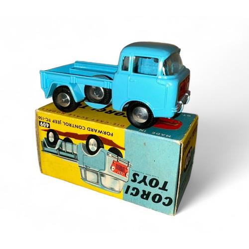 166 - Corgi Jeep FC-150 No. 409, pale blue, metal tow hook, flat hubs and spare wheel, generally excellent... 