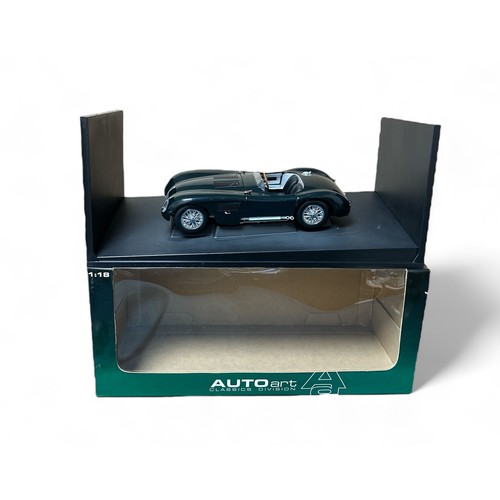 22 - Autoart 1/18th scale Jaguar C Type green No. 73500, generally excellent in excellent to good plus wi... 