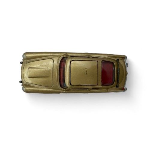 106 - Corgi No. 261James Bond 007 Goldfinger film Aston Martin DB5, metallic gold with James Bond & Bandit... 