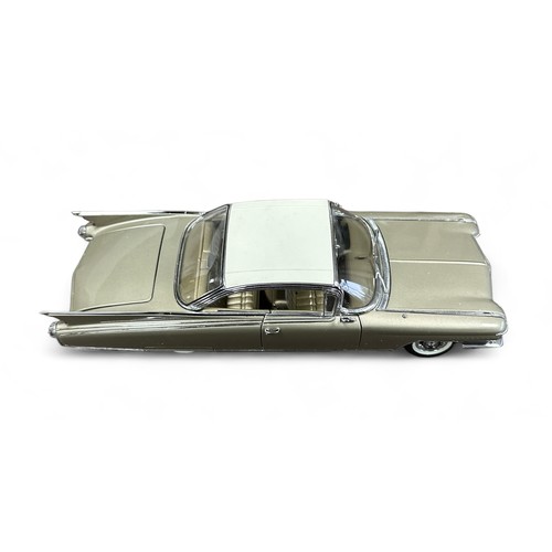 231 - Danbury Mint 1/24th scale 1960 Cadillac Eldorado Seville metallic champagne gold with off-white roof... 