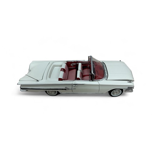 235 - Danbury Mint 
Danbury Mint 1/24th scale 1960 Chevrolet Impala, white with red/white interior includi... 