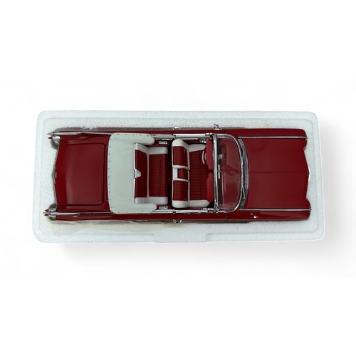 239 - Danbury Mint 1/24th scale 1959 Cadillac Series 62 red with off white/red interior and hood down, gen... 