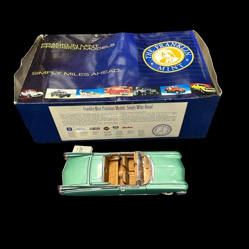 263 - Franklin Mint 1/24th scale 1959 Cadillac Eldorado Biarritz metallic green with tan interior No. B11E... 