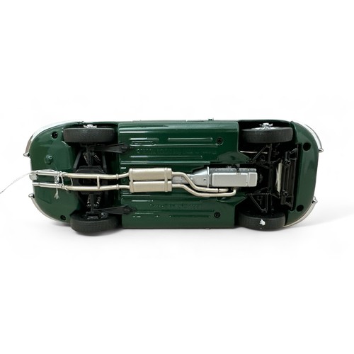 270 - Franklin Mint 1/24th scale Jaguar E-Type drophead green with cream interior No. B11TC05, generally e... 