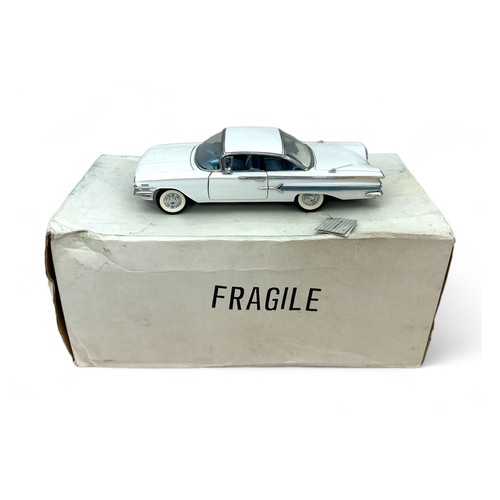 273 - Franklin Mint 1/24th scale 1960 Chevrolet Impala No. B11SR71, white with white roof and blue interio... 