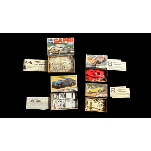 672 - Airfix 1/32nd scale unmade Ford kits, mainly on sprue, with instructions and unused decals (where pr... 