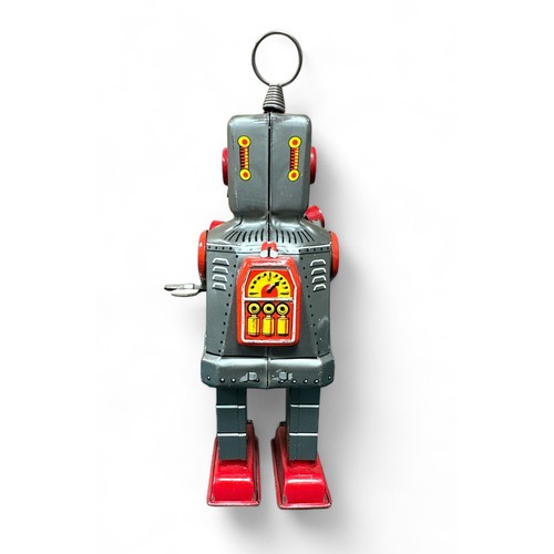 414 - KO (Japan) Sparky Robot tinplate clockwork with key, generally excellent to good plus. Contents unch... 