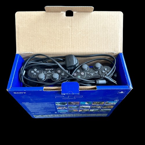 434 - Sony Playstation PS2 and games, generally excellent in good plus boxes, with PS2, hand controllers a... 