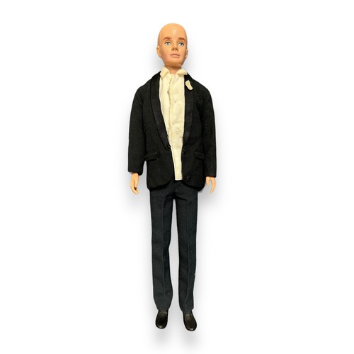 435 - 1961 Barbie's boyfriend Ken doll No. 750, dressed in tuxedo outfit (without bow tie), generally exce... 