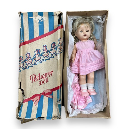 466 - Pedigree 1950s walking doll, blonde, pink dress and white shoes, plus dresses, approx. H40cm, genera... 