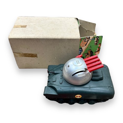 429 - Triang Missile Launcher clockwork with key (untested), black tracks, red plastic missiles (4-fused e... 