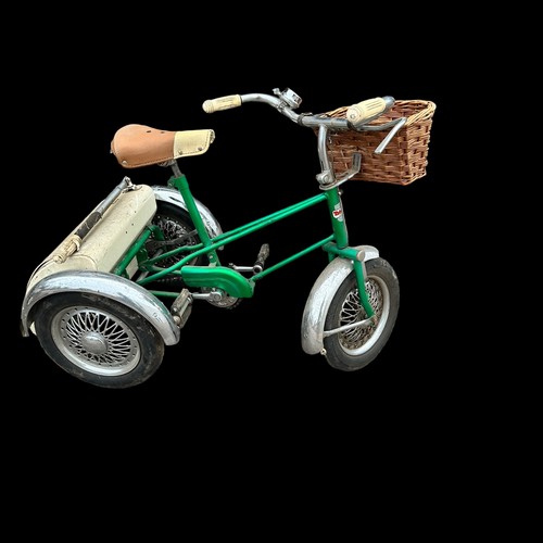 423 - Triang green tricycle with white boot, front basket and Mickey Mouse bell, plus red Triang Scooter, ... 