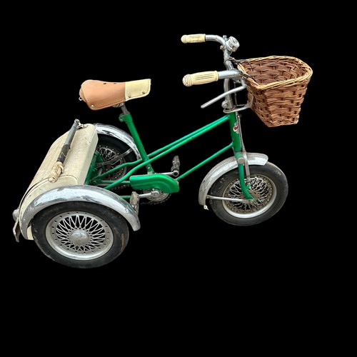 423 - Triang green tricycle with white boot, front basket and Mickey Mouse bell, plus red Triang Scooter, ... 