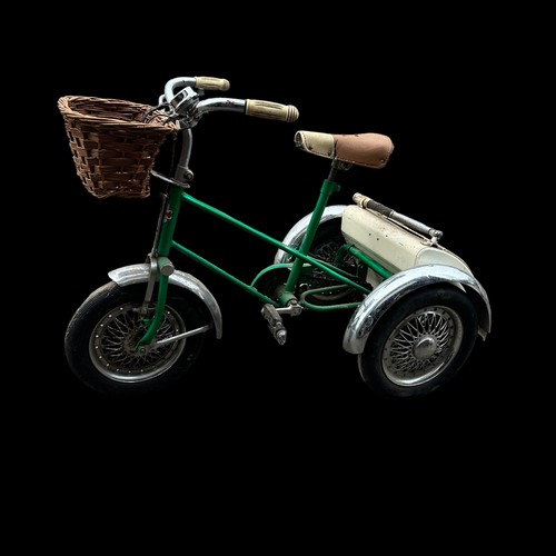 423 - Triang green tricycle with white boot, front basket and Mickey Mouse bell, plus red Triang Scooter, ... 