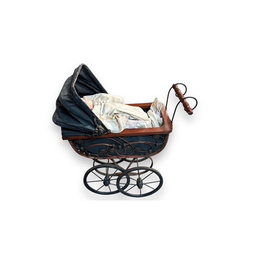 469 - Modern doll & toy pram, doll realistic dressed with maker's marks to back of head 