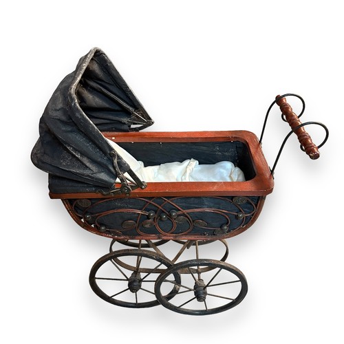 469 - Modern doll & toy pram, doll realistic dressed with maker's marks to back of head 