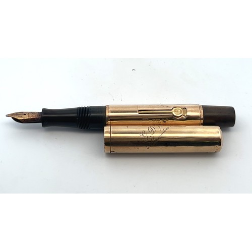 134 - A Waterman Ideal 9ct gold fountain pen with hallmarks to barrel. Lid inscribed 'GDW 4th December 193... 