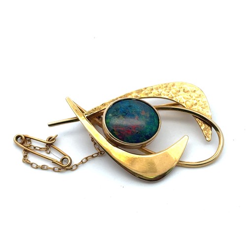 8 - An imitation opal brooch, stamped 9ct. Length40mm, weight 6.13g.

Please see the buyer's terms and c... 