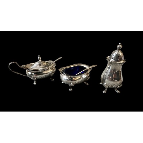 78 - Silver cruet condiments set by CSR Limited, London, 1972. Including blue glass internals. Silver wei... 