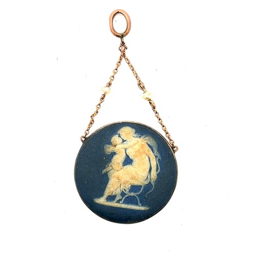 24 - A vintage Wedgwood blue cameo pendant in a yellow metal collared mount suspended from a gold and see... 