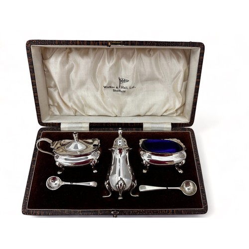 122 - A cased Walker & Hall silver plated cruet set.