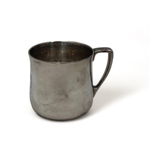 75 - Tiffany - a silver christening mug, number 20897. Height 6cm, weight 141g.