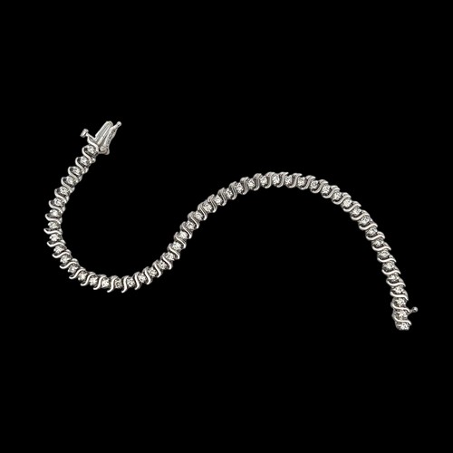 11 - A diamond tennis bracelet stamped 14ct. Each  of the round brilliant cut stones approx 2.1mm in diam... 