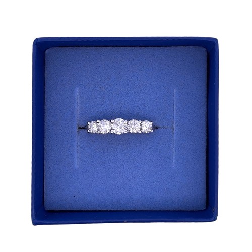 34 - An 18ct white gold five stone diamond ring, size N. Total diamond weight 0.8ct. 2.93g