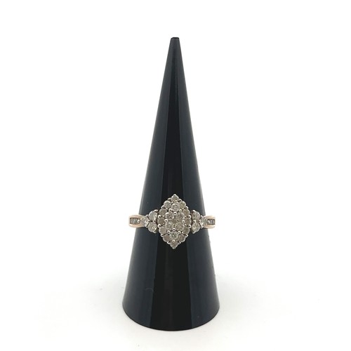 35 - A 9ct yellow gold and diamond ring, pavé set in a marquise shaped setting, size P. Weight 3.49g.