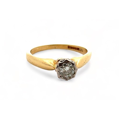 43 - A hallamrked 18ct gold diamond ring. Diamond approx 4.3mm in diameter. Clarity estimated SI1/ SI2.