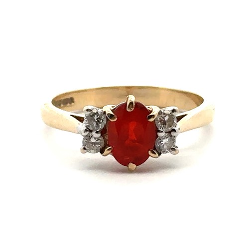 44 - A fire opal and diamond ring in hallmarked 9ct gold, size N.