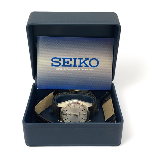 59 - A boxed gents Seiko watch No. 6N76-00A0. Watch is winding and ticking.