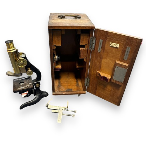 163 - E. Leitz Wetzlar Microscope in fitted wooden case, model Number 103994 comes with a range of accesso... 