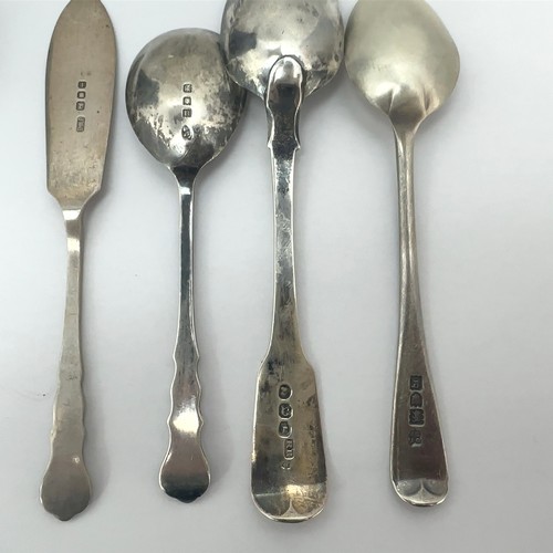 109 - A range of silver spoons, a silver knife and a pair of silver sugar tongs. Qty 9. Weight 167g